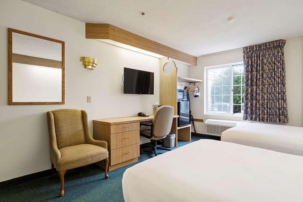 Charlevoix Inn & Suites Surestay Collection By Best Western Rum bild